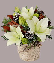 Bouquet of white lilies with greenery, pinecones, and cinnamon sticks in a birch bark container on a white background.