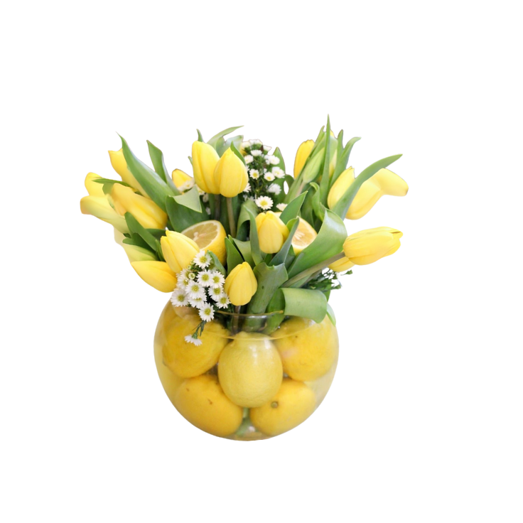 Fresh lemon with yellow tulips arrangement 