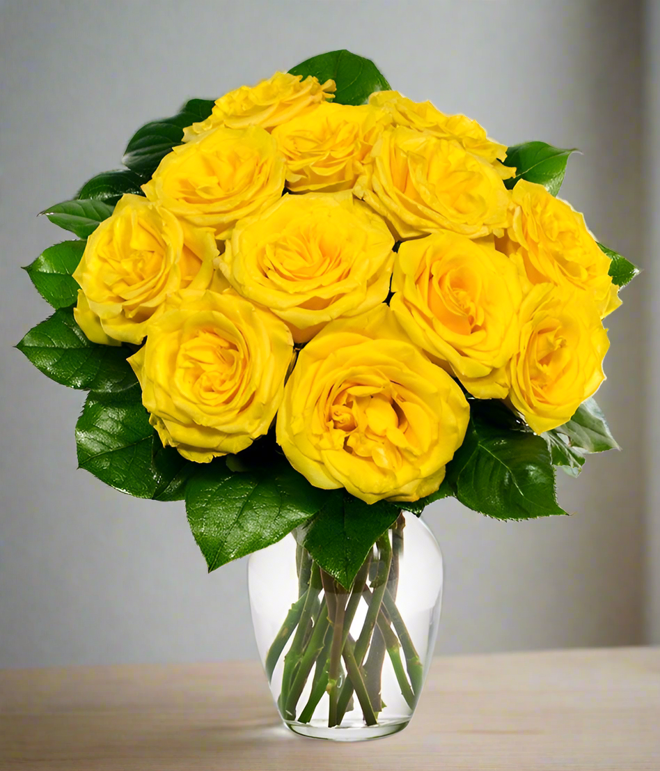 Yellow roses in a transparent vase