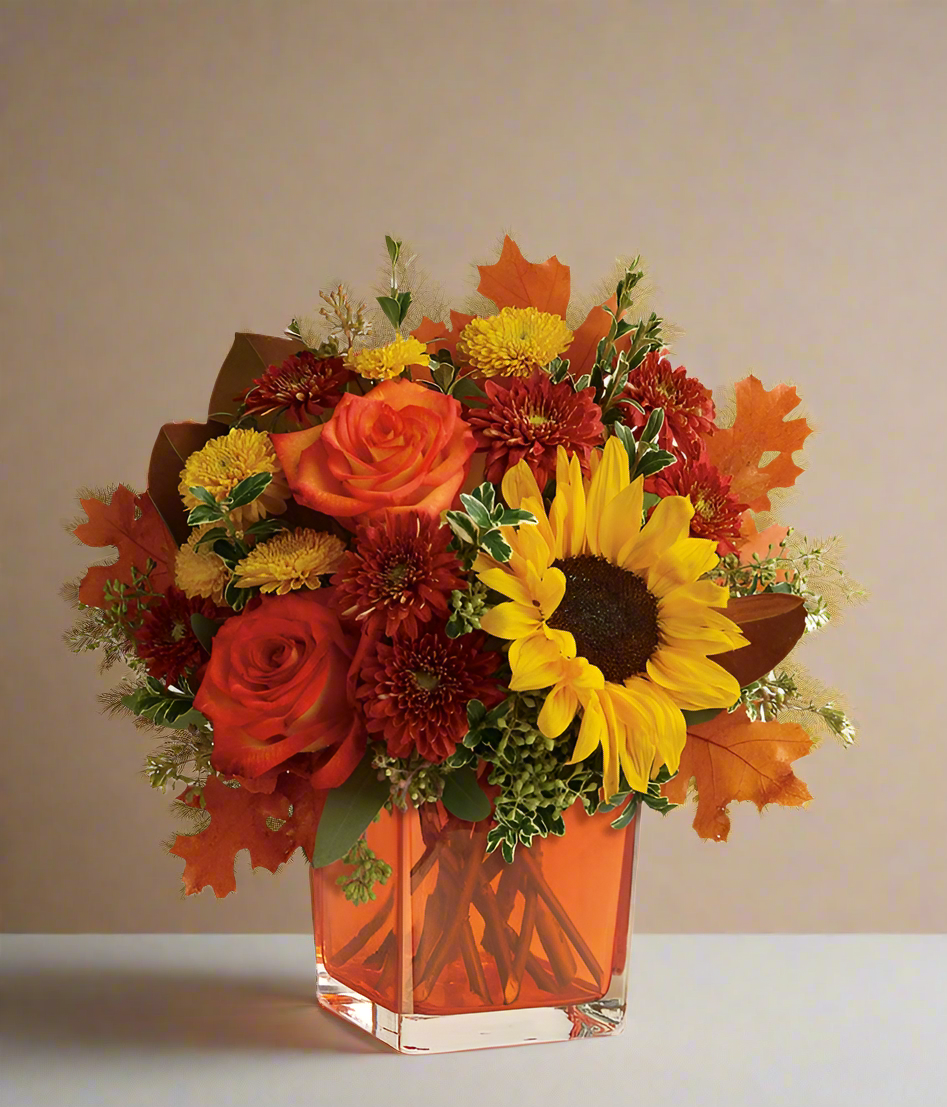 Fall flowres in orange vase