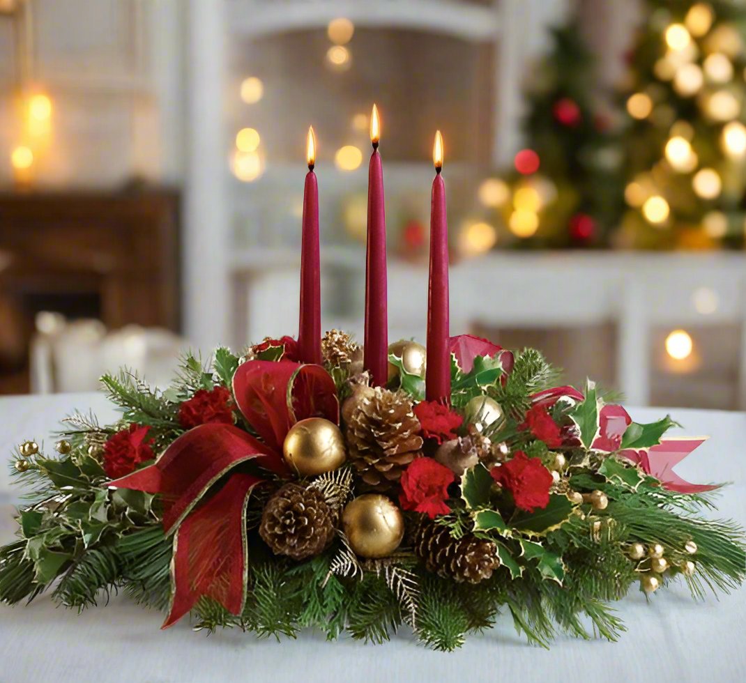 Decorative Christmas table setting with a centerpiece, candles, and festive decorations.