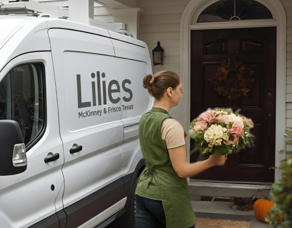 Person holding flowers in front of a white van with 'Lilies' branding.