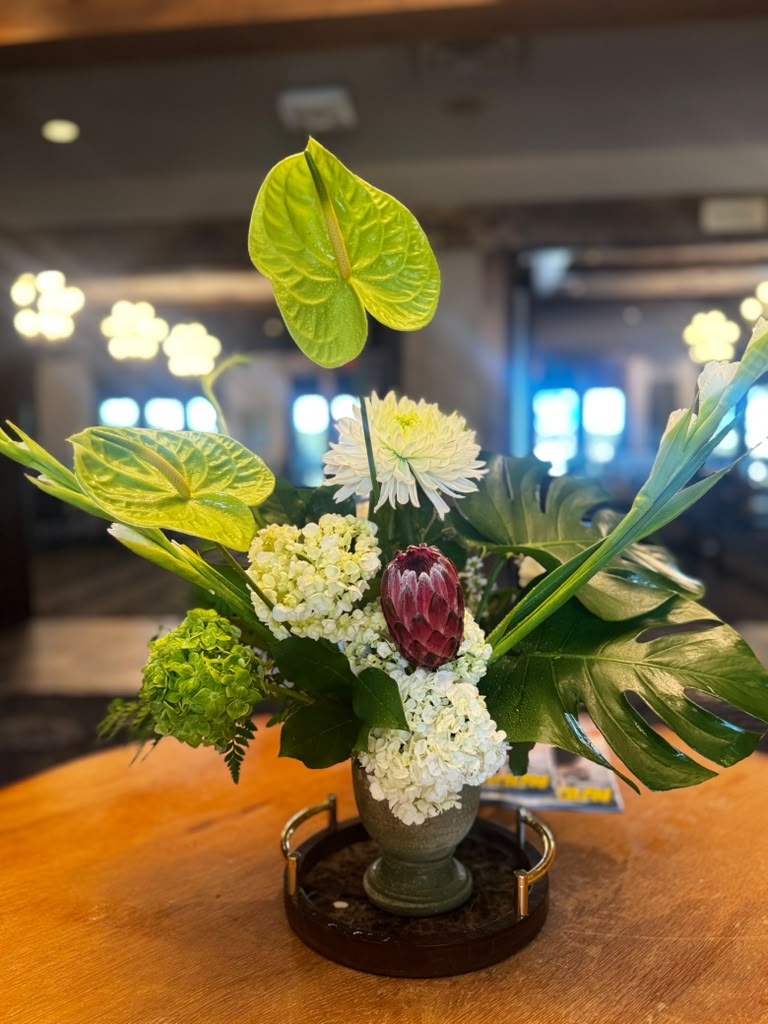 Custom floral arrangement for private club lobby by Lilies Floral Design