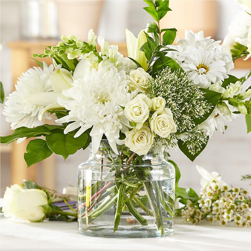 Bouquet of white flowers in a clear vase. Same day delivery, McKinney Texas