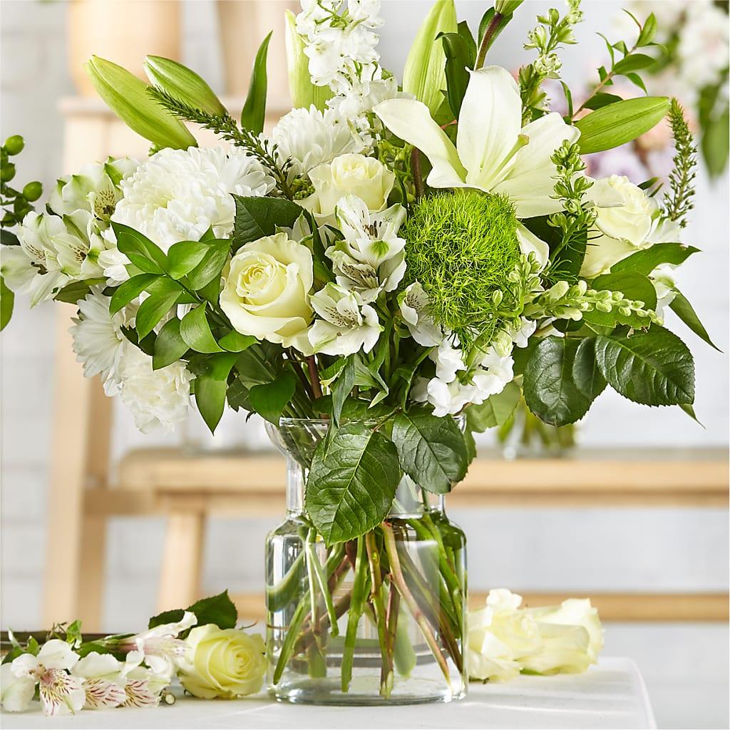 Bouquet of white and green flowers in a clear vase. Same day delivery McKinney  , Frisco, Allen, Prosper Texas 