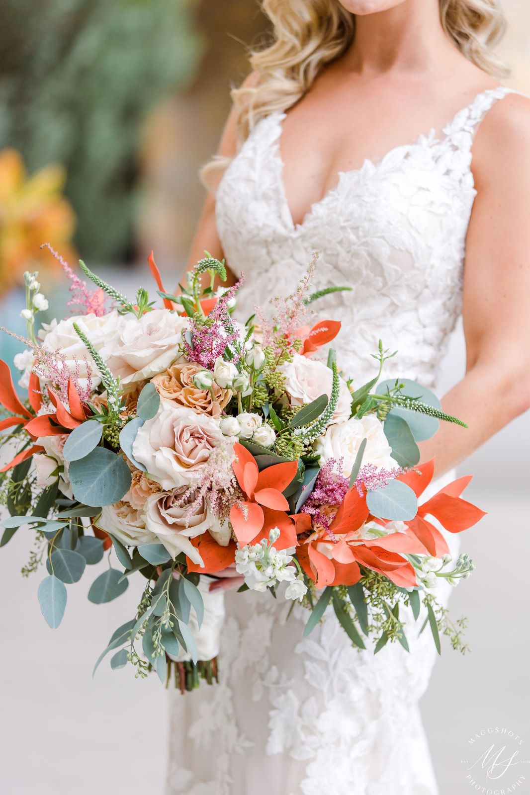 bright coral wedding bouquet neutral roses greenery McKinney TX florist