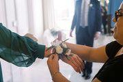 Corsage in her hand